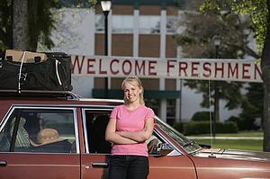 A woman arriving at college