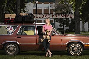A woman arriving at college