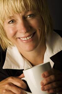 A woman holding a mug