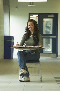 Girl in school desk