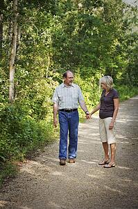 Husband and wife on walking trail