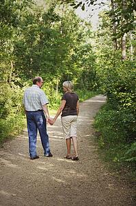 Husband and wife on walking trail