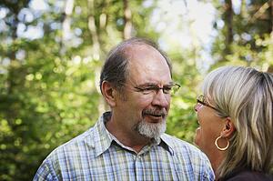 Husband and wife smiling together