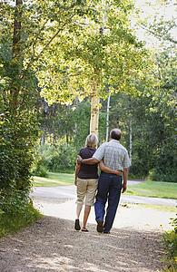 Husband and wife on walking trail