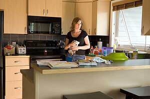 A woman in a kitchen