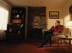 A man sitting in his study