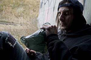 Man with bottle of alcohol