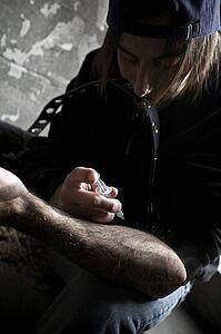 Man injecting drugs