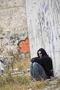 Man beside graffiti