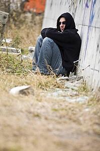 Man beside graffiti