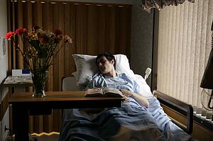 Man in a hospital bed