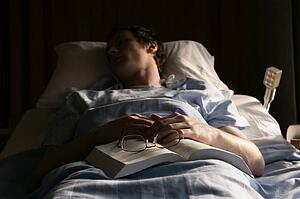 Man in a hospital bed