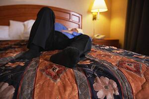 Man lying on bed