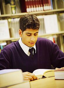 Student studying in library