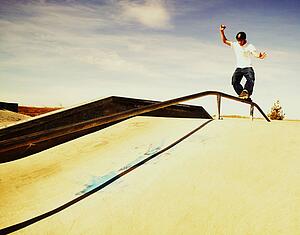 Skating down a rail