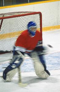 Hockey goalie making save