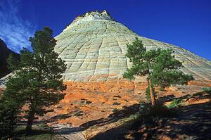 Conical rock formation with red base