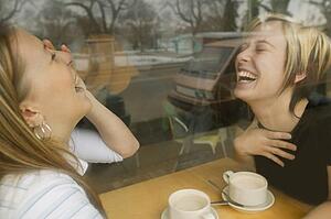 Two women laughing
