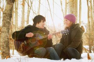 Man serenades woman