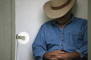 Cowboy in the outhouse