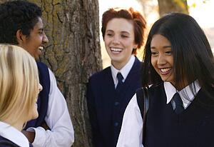 Group of diverse students at a break hanging out