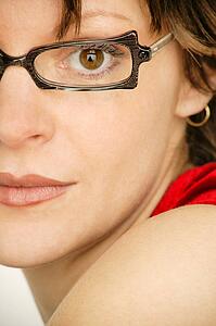 Half a lady's face with glasses