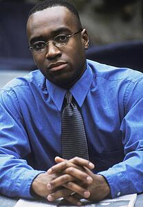 Businessman with folded hands