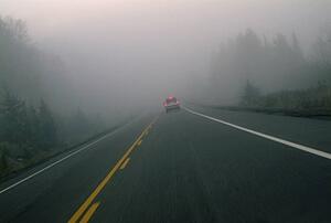A highway that leads into fog