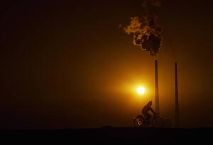 Cycling by Power Station, Poolbeg, Dublin, Ireland