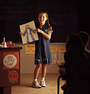 Child with picture of Jesus