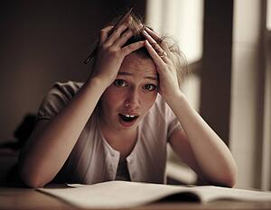 Anxious woman studying