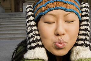 Girl with eyes closed ready for a kiss