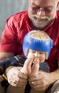 Grandpa playing with grandson