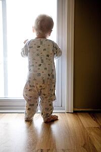 Baby looking out the window