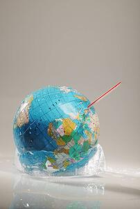 Globe in ice with straw