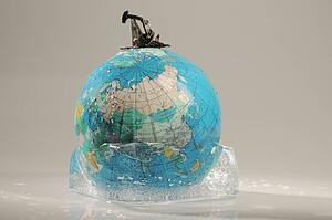 Globe in ice with oil derek