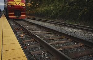 Train on the tracks by a platform