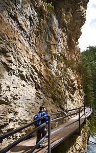 Boy walking along Johnson Canyon, Banff, Alberta, Canada