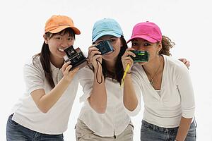 Group of friends with cameras