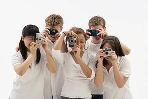Group of friends with cameras