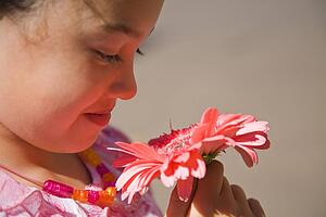 Child with flower