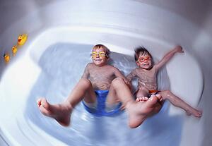 Boys playing in the bathtub