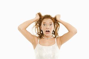 Bride pulling her hair and stressed