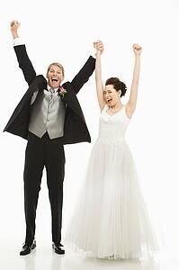 Groom and bride cheering
