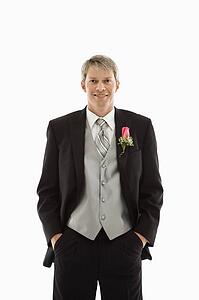 Portrait of Caucasian male in tuxedo. 