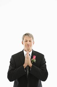 Groom praying