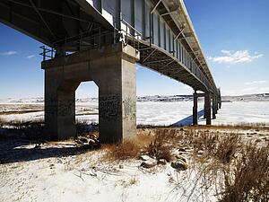 Bridge over frozen water in Midwestern