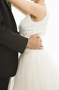 Close up of bride and groom dancing