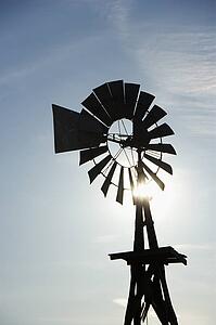 Silhouetted wind pump in South Dakota, USA