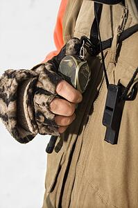 Hand holding walkie talkie